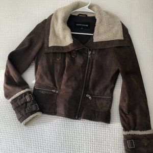 100% leather  Brown Bomber jacket w/faux fur collar. Body lining 100% Cotton